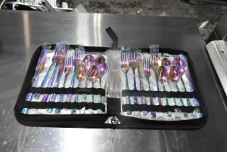 Colorful LAH kitchen silverware set in a black case, featuring forks, spoons, and knives wrapped in plastic, pristine condition.
