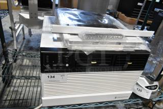 Friedrich CCF08B10A window mount air conditioner, 115 volts, 1 phase, appears new with packaging and control panel visible.