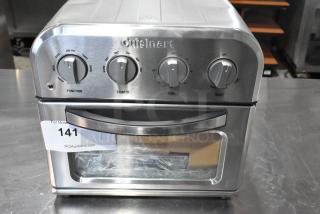 Brand new Cuisinart TOA-23 countertop toast oven air fryer. Features knobs for function, temp, time, and toast. Scratch and dent condition.