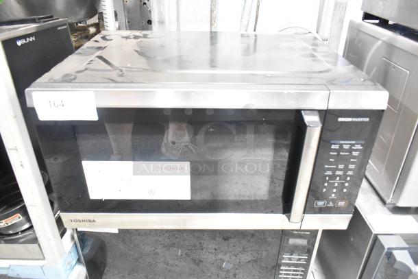 Toshiba  Metal Countertop Microwave Oven w/ Plate. 120 Volts, 1 Phase. - Image 1 of 8