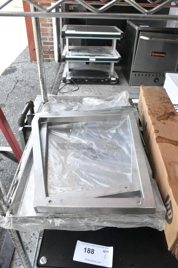Auction lot with metal frames, HP Bright White Inkjet Paper box, and various metal pieces. Tag reads "188 QTY 1".