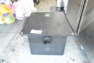 BRAND NEW Ashland PolyTrap 4815 30 lb. grease trap with threaded connections, minor scratches. Black, square design.