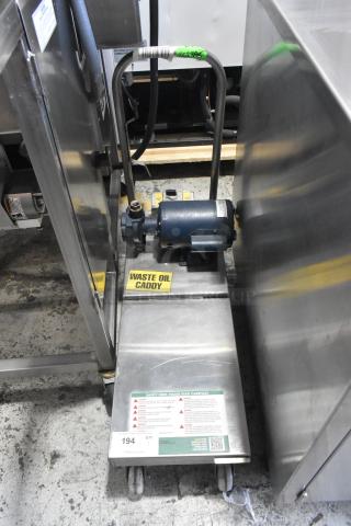 Frontline 10SS Stainless Steel Oil Filtration System on casters, labeled "Waste Oil Caddy" with visible safety instructions.