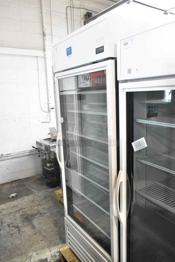 2021 True TSCI-600R-G-PH Metal Commercial Single Door Reach In Cooler Merchandiser w/ Poly Coated Racks. 115 Volts, 1 Phase. - Image 3 of 8