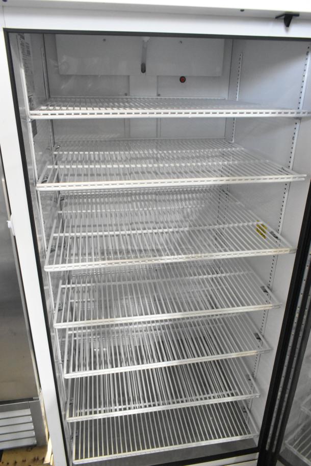 2021 True TSCI-600R-G-PH Metal Commercial Single Door Reach In Cooler Merchandiser w/ Poly Coated Racks. 115 Volts, 1 Phase. - Image 7 of 8