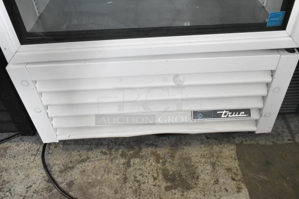 2021 True TSCI-600R-G-PH Metal Commercial Single Door Reach In Cooler Merchandiser w/ Poly Coated Racks. 115 Volts, 1 Phase. - Image 4 of 8