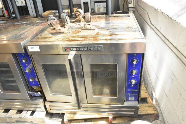 Bakers Pride Cyclone Stainless Steel Commercial Natural Gas Powered Full Size Convection Oven w/ View Through Doors, Metal Oven Racks, Thermostatic Controls and Commercial Casters. - Image 1 of 6