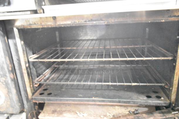 US Range Metal Commercial Natural Gas Powered 6 Burner Range w/ Flat Top Griddle, 2 Ovens, Over Shelf and Back Splash. - Image 7 of 12
