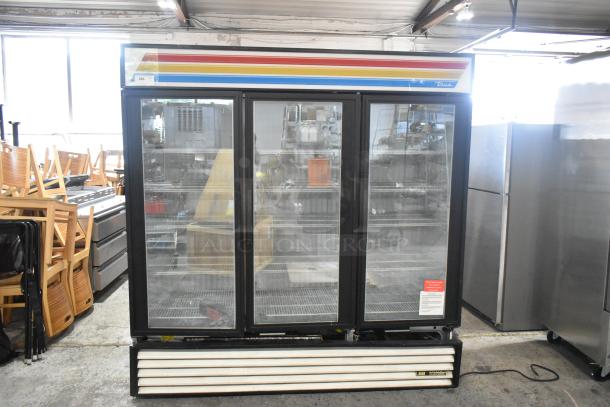 True GDM-72F Metal Commercial 3 Door Reach In Freezer Merchandiser w/ Poly Coated Racks. 115/208-230 Volts, 1 Phase. - Image 1 of 9