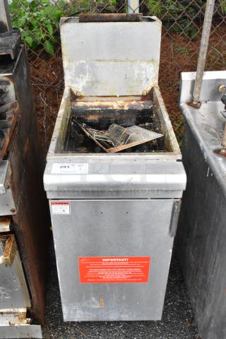 Stainless steel GF-90/LPG commercial propane fryer, 90,000 BTU, floor style, visible wear, tags with safety warnings.