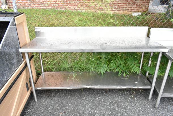 Stainless Steel Table w/ Back Splash and Under Shelf. - Image 1 of 6