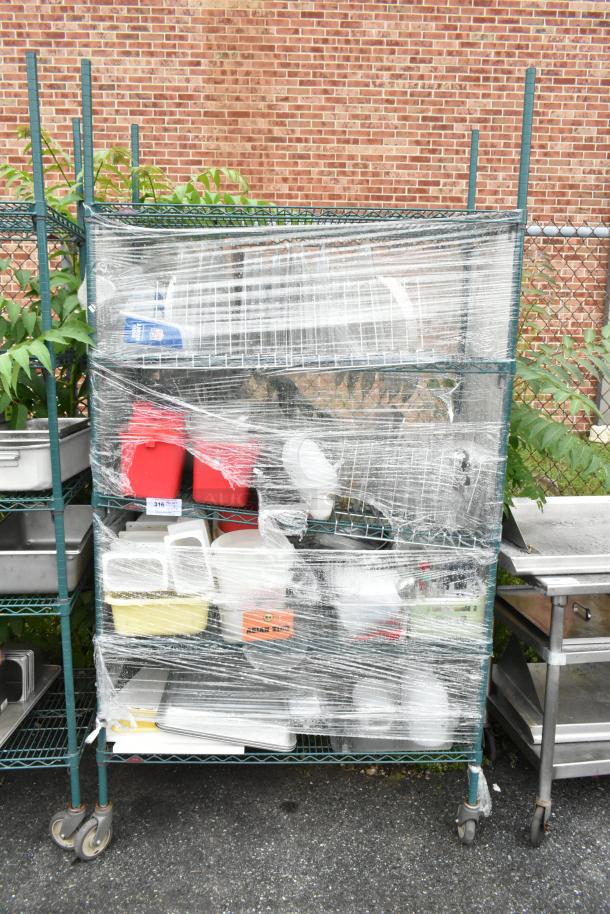 Green Finish 5 Tier Wire Shelving Unit w/ Contents Including Poly Bins on Commercial Casters. BUYER MUST DISMANTLE. PCI CANNOT DISMANTLE FOR SHIPPING. PLEASE CONSIDER FREIGHT CHARGES. - Image 1 of 7