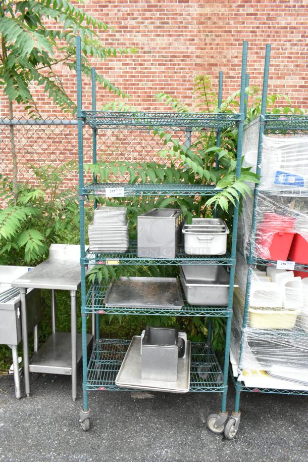 Green Finish 5 Tier Wire Shelving Unit w/ Contents Including Metal Baking Pans on Commercial Casters. BUYER MUST DISMANTLE. PCI CANNOT DISMANTLE FOR SHIPPING. PLEASE CONSIDER FREIGHT CHARGES. - Image 1 of 4