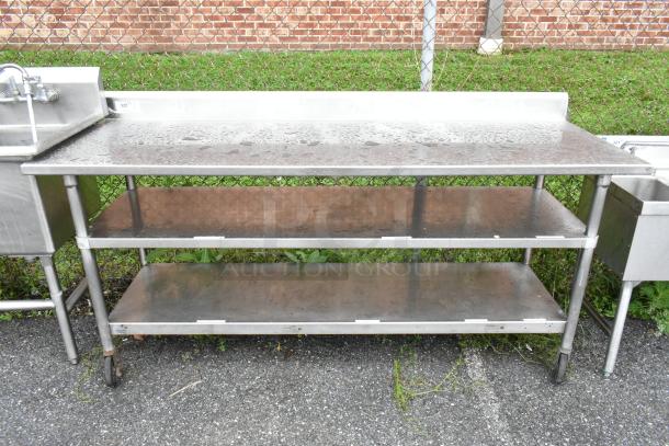 Stainless Steel Table w/ 2 Under Shelves on Commercial Casters. - Image 1 of 6