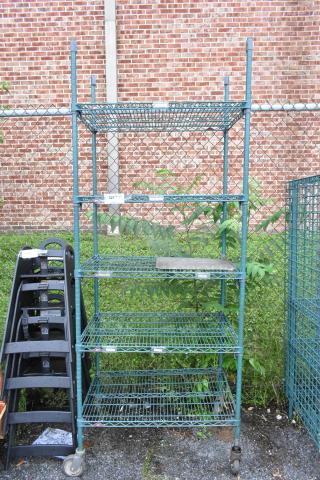 Metro Green 5-tier wire shelving unit on commercial casters, in good condition. Requires dismantling for transport.