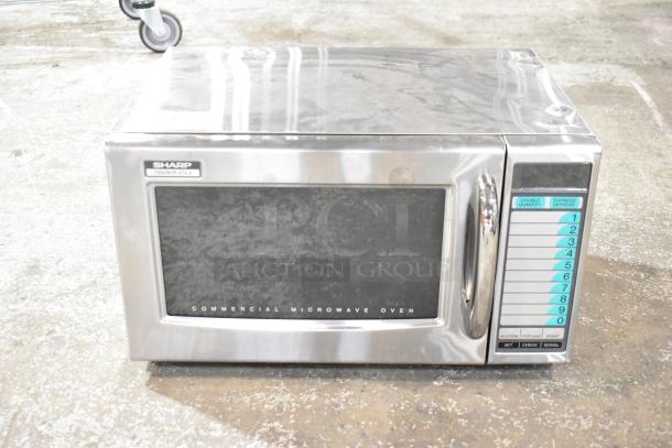 2024 Sharp R-21LVF Stainless Steel Countertop Microwave Oven. 120 Volts 1 Phase. - Image 1 of 8