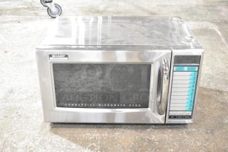 2024 Sharp R-21LVF stainless steel countertop microwave oven, 120 volts, commercial use, nine-button keypad control.