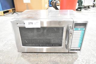 2022 Sharp R-21LVF stainless steel countertop microwave oven, 120 volts, 1 phase, visible operational keypad, used condition.