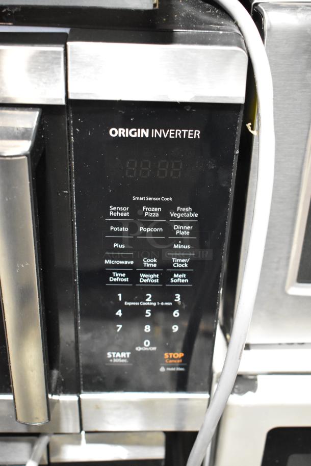 Toshiba metal countertop microwave oven with digital keypad, featuring smart sensor cook options. 120 volts, 1 phase.
