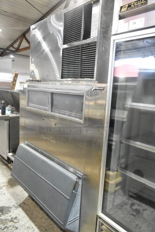Hoshizaki KM-1300SAF Stainless Steel Commercial Ice Head on Follett Commercial Ice Bin. 208-230 Volts, 1 Phase. - Item #1192939