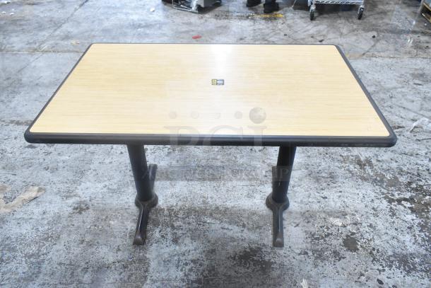 Dining height table with wood top and black metal base, industrial setting. Includes 5 identical tables with purchase.
