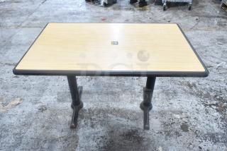 Dining height table with wood top and black metal base, industrial setting. Includes 5 identical tables with purchase.