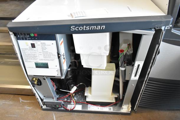 Brand new Scotsman NS0422A-1B Prodigy Plus Series 22" nugget ice machine, 420 lb capacity, visible components and wiring.