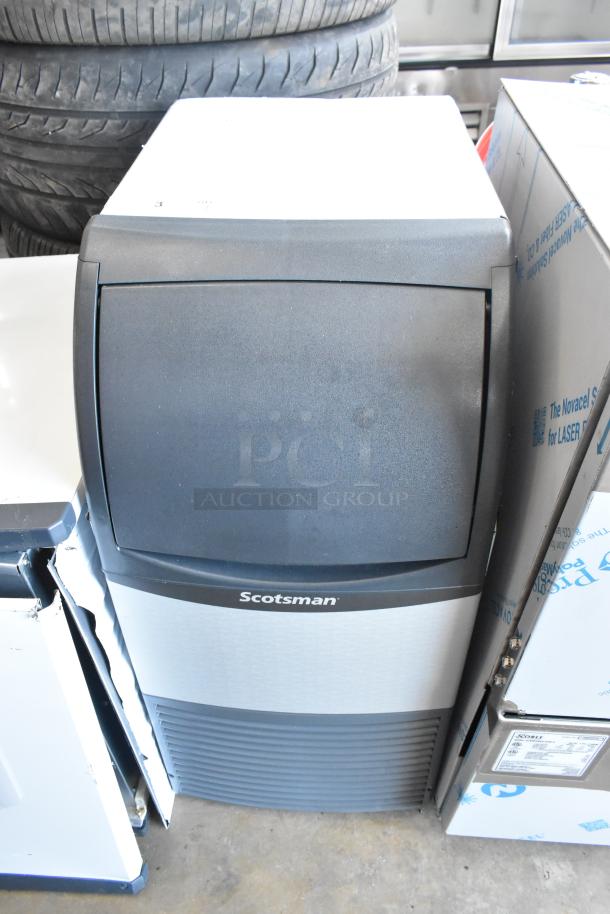 Brand new 2025 Scotsman CU0715MA-1A stainless steel undercounter ice machine, 80 lb. capacity, 115V, with minor scratches.