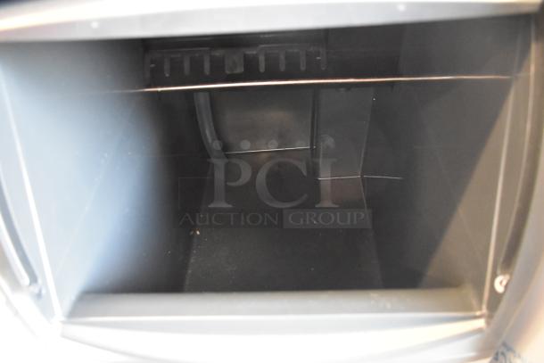 Scotsman CU0715MA-1A stainless steel undercounter ice machine interior. New, scratch and dent condition.