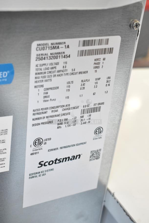 BRAND NEW 2025 Scotsman CU0715MA-1A stainless steel ice machine label, showing model, voltage, and ETL certification.