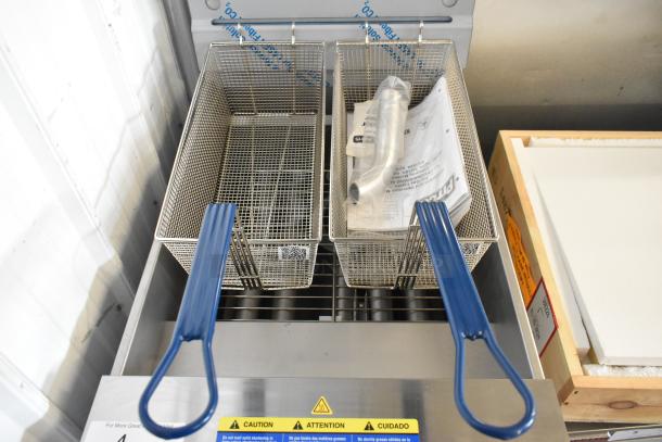 Brand new Pitco Frialator SG18 fryer, 75 lb. capacity, natural gas, stainless steel, 140,000 BTU, with 2 metal baskets.