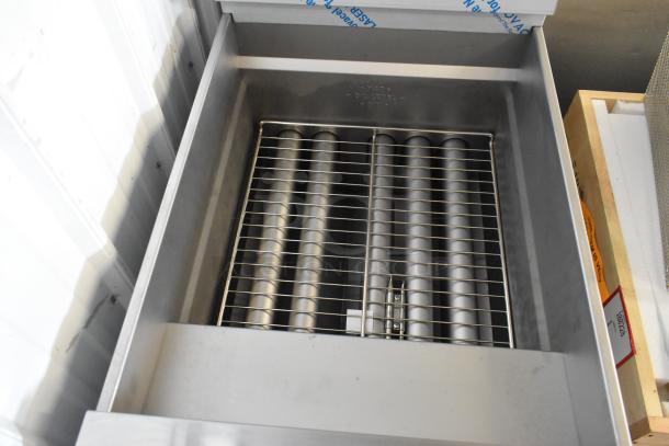 Brand new 2025 Pitco Frialator SG18 stainless steel floor fryer, 75 lb. capacity, natural gas, 140,000 BTU, with 2 metal fry baskets.