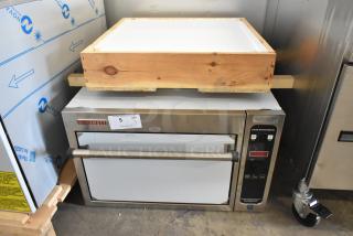 BRAND NEW Blodgett 1415 stainless steel commercial countertop oven, 208V, 3-phase, with minor scratches and dents.