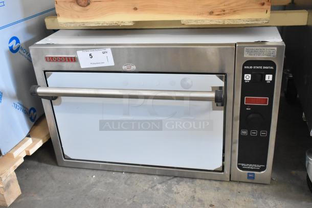 Brand new Blodgett 1415 stainless steel countertop single deck oven, 208V, 3 phase, with minor scratches, solid state digital controls.