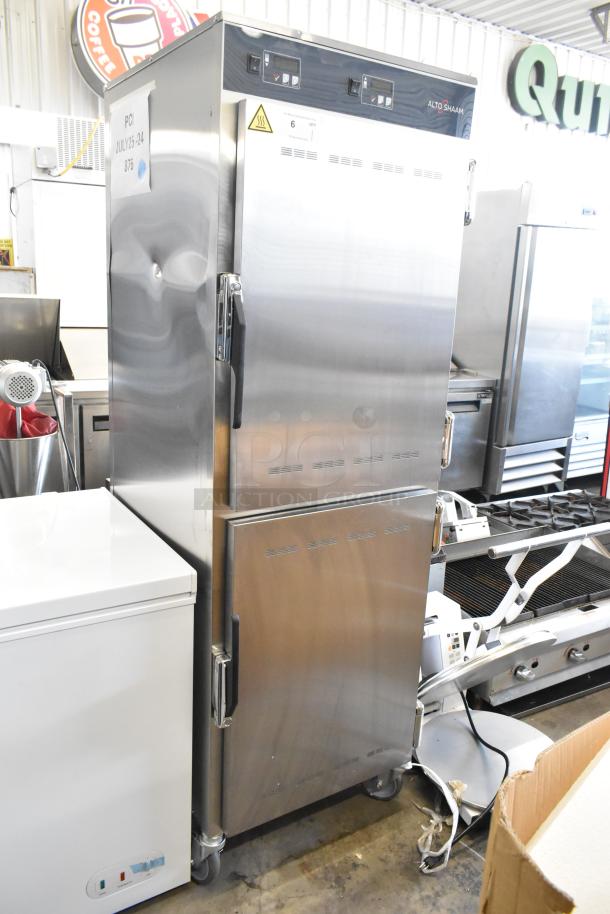 Brand new Alto Shaam 1200-UP stainless steel 16-pan holding cabinet, scratch and dent, with universal racks, 120V, on casters.