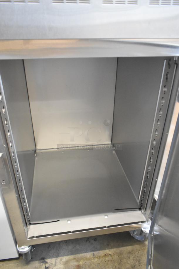 Brand new Alto Shaam 1200-UP stainless steel 16 pan holding cabinet, universal racks, Dutch door, commercial casters.