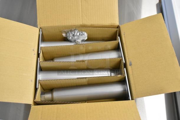 Cardboard box containing components and hardware for a Pitco Frialator SG18. Items arranged neatly in sections.