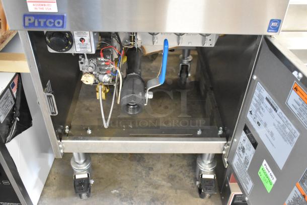Brand new Pitco Frialator SG18 stainless steel propane gas fryer, 140,000 BTU, on commercial casters. Visible USA label.