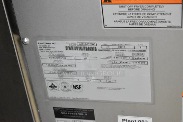 2023 Pitco Frialator SG18 stainless steel fryer, propane gas, 140,000 BTU, commercial casters, warning and info labels visible.