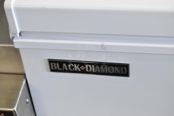 Black Diamond BDCF-13R metal chest freezer with hinge lid. 115 volts, 1 phase. Brand label visible.