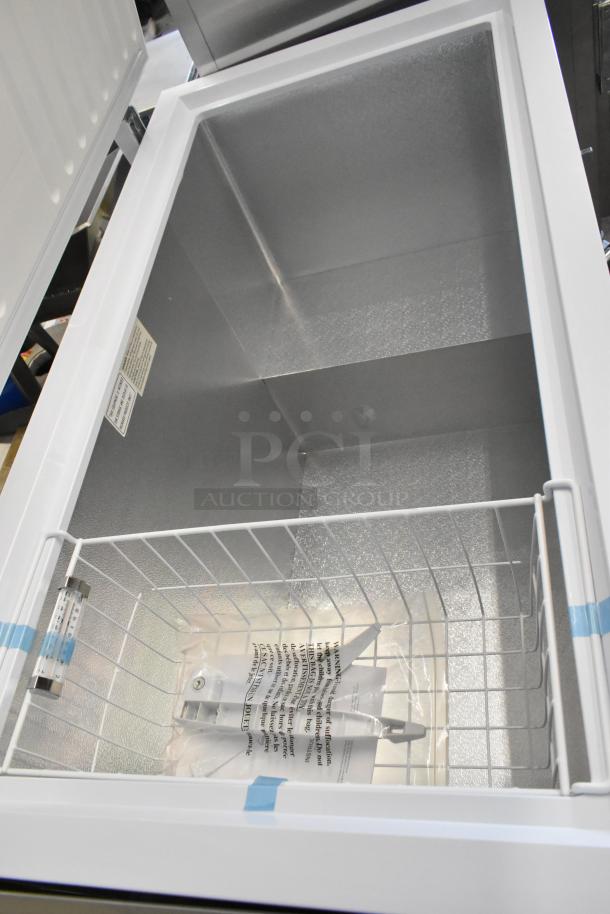 Black Diamond BDCF-13R metal chest freezer with hinge lid, 115 volts, 1 phase. Interior basket, pristine condition.