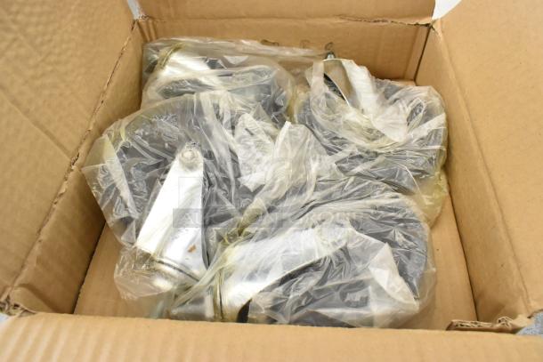 Six boxes of 4 CT-5 MT10 commercial casters, brand new with minor scratches, in unpacked condition.