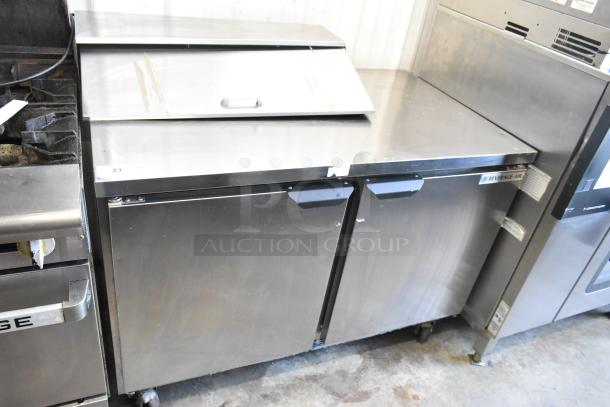 Beverage Air SPE48HC-08 stainless steel prep table with bain marie top, commercial casters, 115V, 1-phase, used condition.