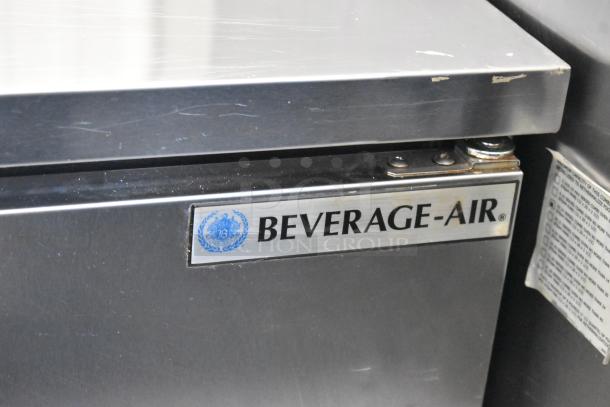 Beverage Air SPE48HC-08 stainless steel commercial sandwich salad prep table with logo, on casters, 115V, 1 phase.
