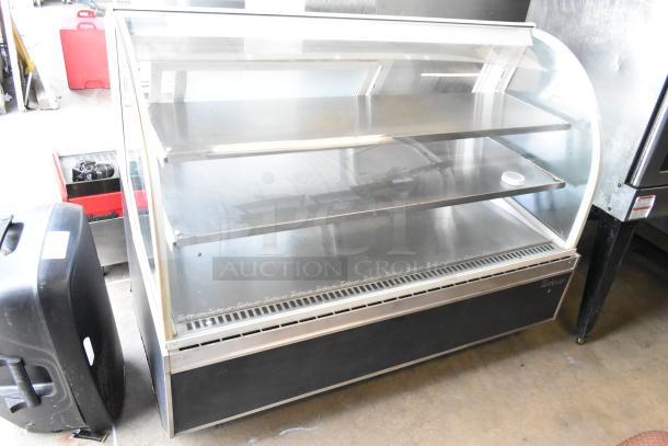 Turbo Air TD-5R metal commercial deli display case, 115 Volts, 1 Phase, two shelves, curved glass front, good condition.
