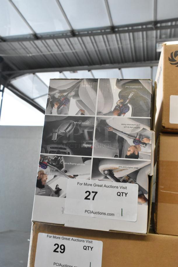 IN ORIGINAL BOX! Dyson V7 Car and Boat Hand Vacuum Cleaner. New with illustrated packaging. Auction stickers visible.