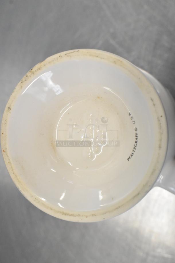 White ceramic footed mug by Pfaltzgraff, USA. Slightly worn base. Perfect for collectors or everyday use.