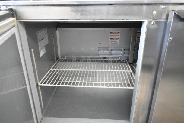 Beverage Air UCR48AHC stainless steel commercial undercounter cooler with two doors, on casters. Interior shelf visible. 115 volts, 1 phase.