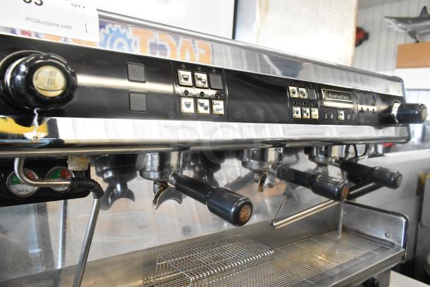 Dalla Corte 3-group espresso machine, stainless steel, includes 3 portafilters, 2 steam wands, commercial use, good condition.