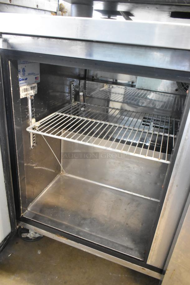 Turbo Air MUR-48 stainless steel 2-door undercounter cooler on casters, 115V, features adjustable wire shelves, commercial use.